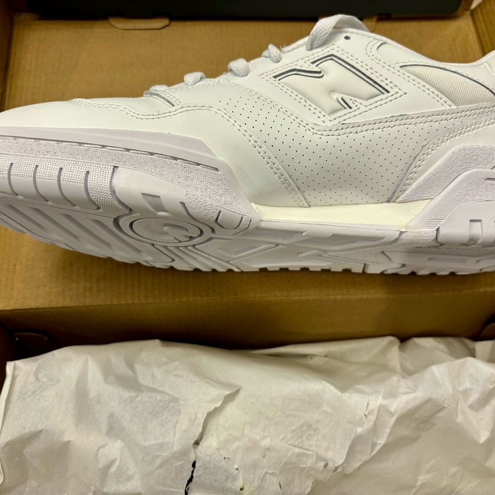 New Balance white 10.5 - my son outgrew b4 ever trying them on !